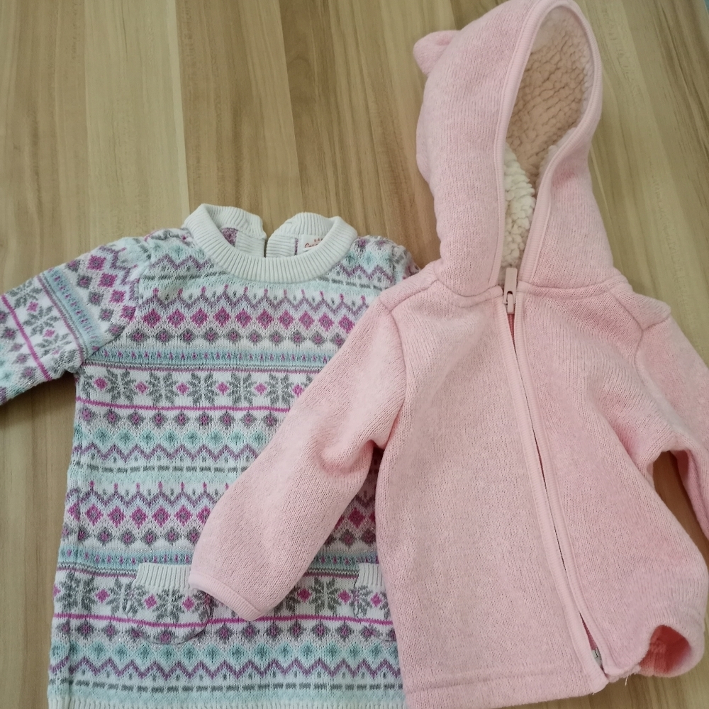 Snuggly bundle of two 3-6 month baby girl sweaters.